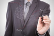 Photo: Businessman hand drawing gear to success concept Businessman hand drawing gear to success concept
