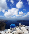 Santorini with churches and sea view in Greece
