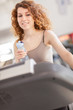 Woman is doing workout on a treadmill