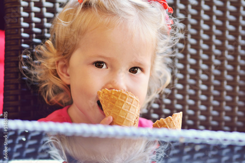 Photo: baby girl with ice cream baby girl with ice cream