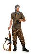 Terrorist with automatic gun and launcher on white background