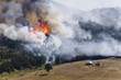 Large fire on Mount. Log cabins are in danger.