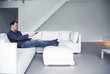 man is watching TV