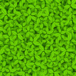 Green leaves vector seamless pattern
