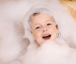 cute little boy in bathroom with foam