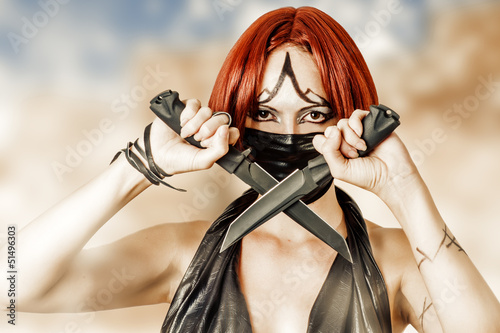 Photo: Sexy dangerous woman in black mask Sexy dangerous woman in black mask