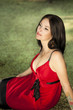 Attractive italian brunette woman outdoors in park summer