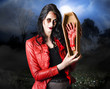 Female grave robber stealing limbs and body parts