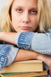 Tired young and blonde female student