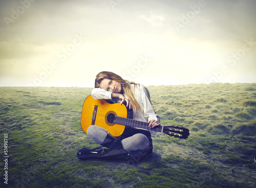 Photo: woman with guitar woman with guitar