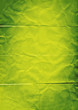folded green paper background
