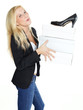 Pretty woman carrying a lot of shoes