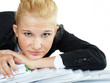 Business woman at work has a headache