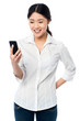 Young girl reading text messages