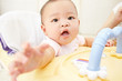 Baby reaching to camera