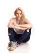 Blond teenage girl sitting
