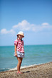 Girl on the pebble beach