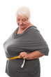 fat woman measuring waist
