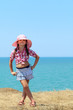 girl in a hat full length