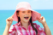 cheerful girl in a hat