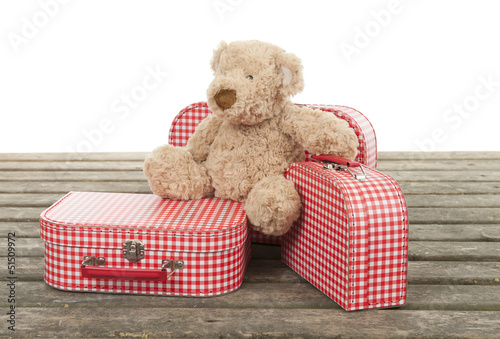 Photo: three vintage red and white suitcases with teddy bear three vintage red and white suitcases with teddy bear