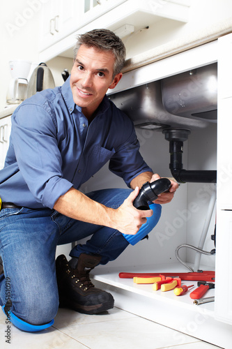 Photo: Plumber. Plumber.