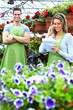 Foto: People working in nursery. People working in nursery.