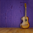 vintage guitar on grunge background texture