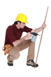 Tradesman using a blowtorch