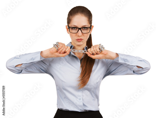 Photo: Woman trying to break a steel chain Woman trying to break a steel chain