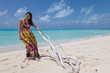 Young beautiful women on the sunny tropical beach