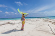 Young beautiful women on the sunny tropical beach