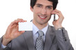 Businessman showing business card