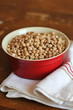 Bowl of dry uncooked chickpeas ready to be cooked