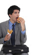 Businessman eating food
