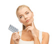 young woman with pills