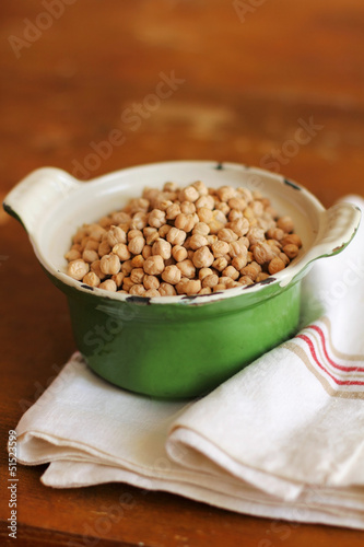 Photo: Bowl of dry uncooked chickpeas ready to be cooked Bowl of dry uncooked chickpeas ready to be cooked