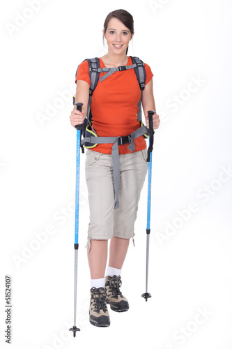 Photo: Woman preparing to go hiking Woman preparing to go hiking