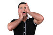 Man with shocked look on face