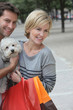 Couple out shopping with dog