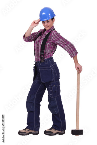 Photo: female builder with hammer female builder with hammer