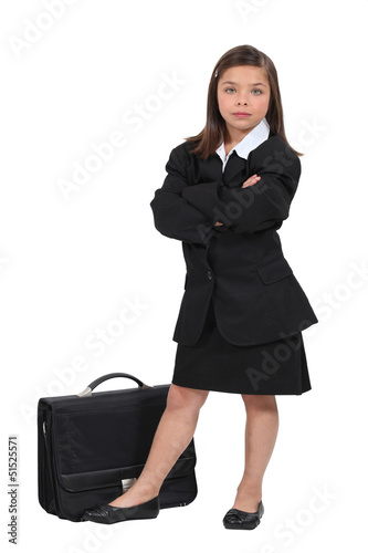 Photo: Girl dressed in black with a briefcase Girl dressed in black with a briefcase