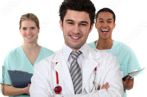 Photo: Doctor and nurses laughing Doctor and nurses laughing