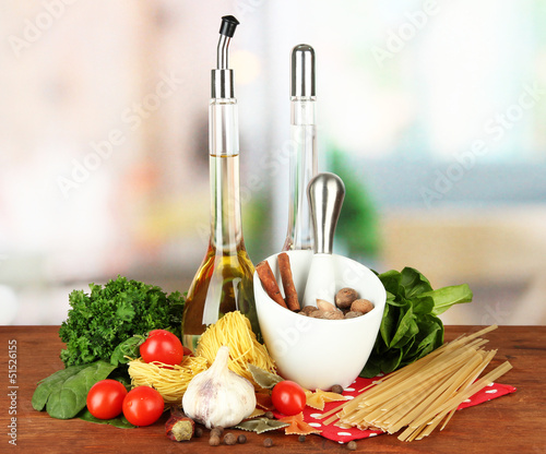 Photo: Composition of mortar, pasta and green herbals, Composition of mortar, pasta and green herbals,