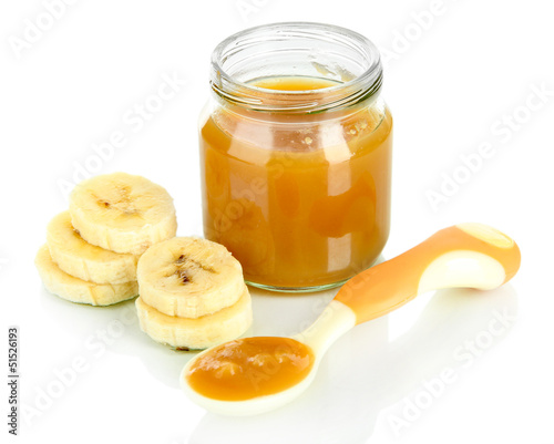 Photo: Baby puree with bananas isolated on white Baby puree with bananas isolated on white