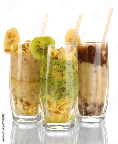 Photo: Delicious fruit smoothies isolated on white Delicious fruit smoothies isolated on white