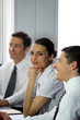Photo: Woman participating in a business meeting Woman participating in a business meeting