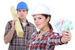 Foto: Two carpenters making money Two carpenters making money
