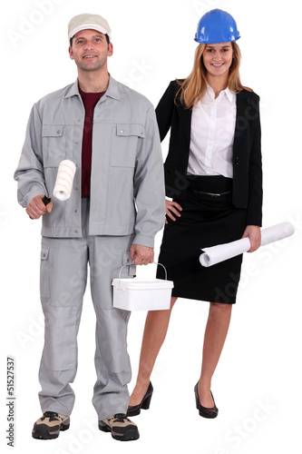 Photo: Tradesman and architect standing side by side Tradesman and architect standing side by side