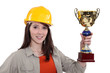 craftswoman holding trophy